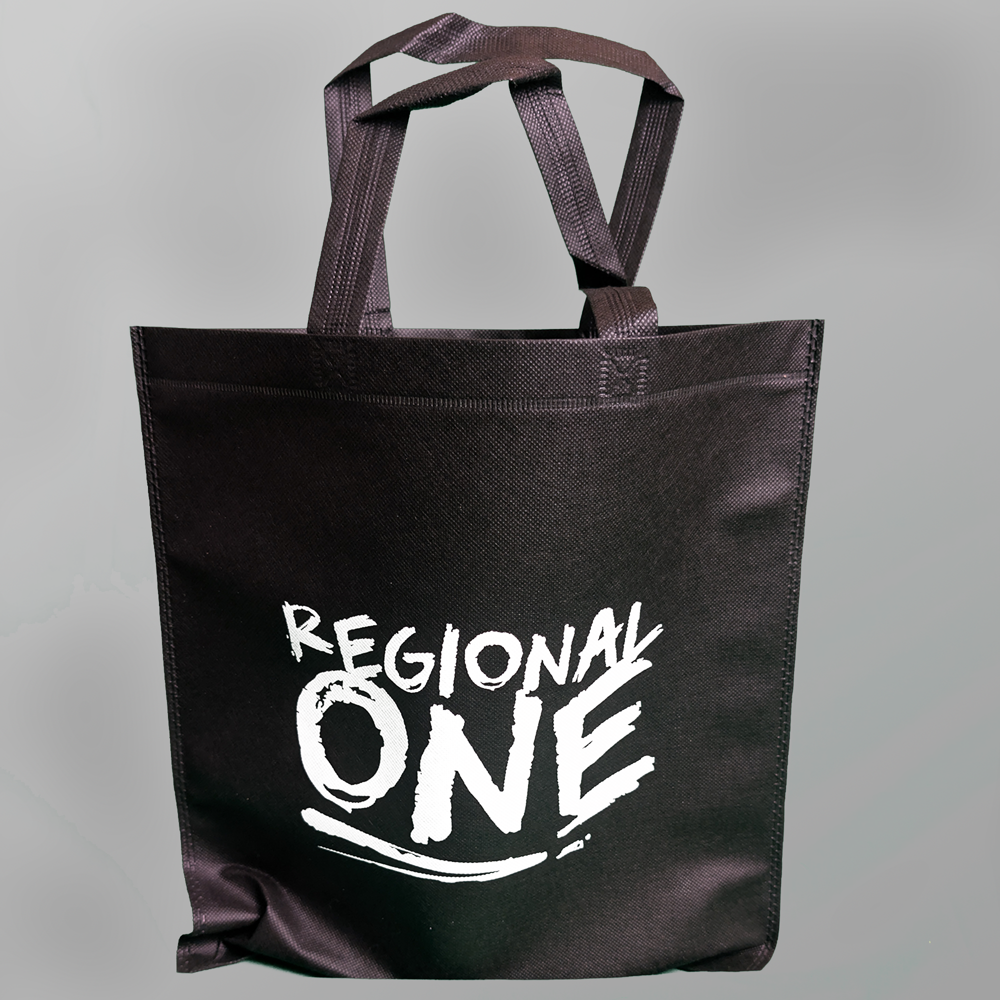 Take Regional One with you wherever you go with our lightweight tote bag, featuring the Regional One logo. Handy for gigs, merch, shopping or everyday essentials.