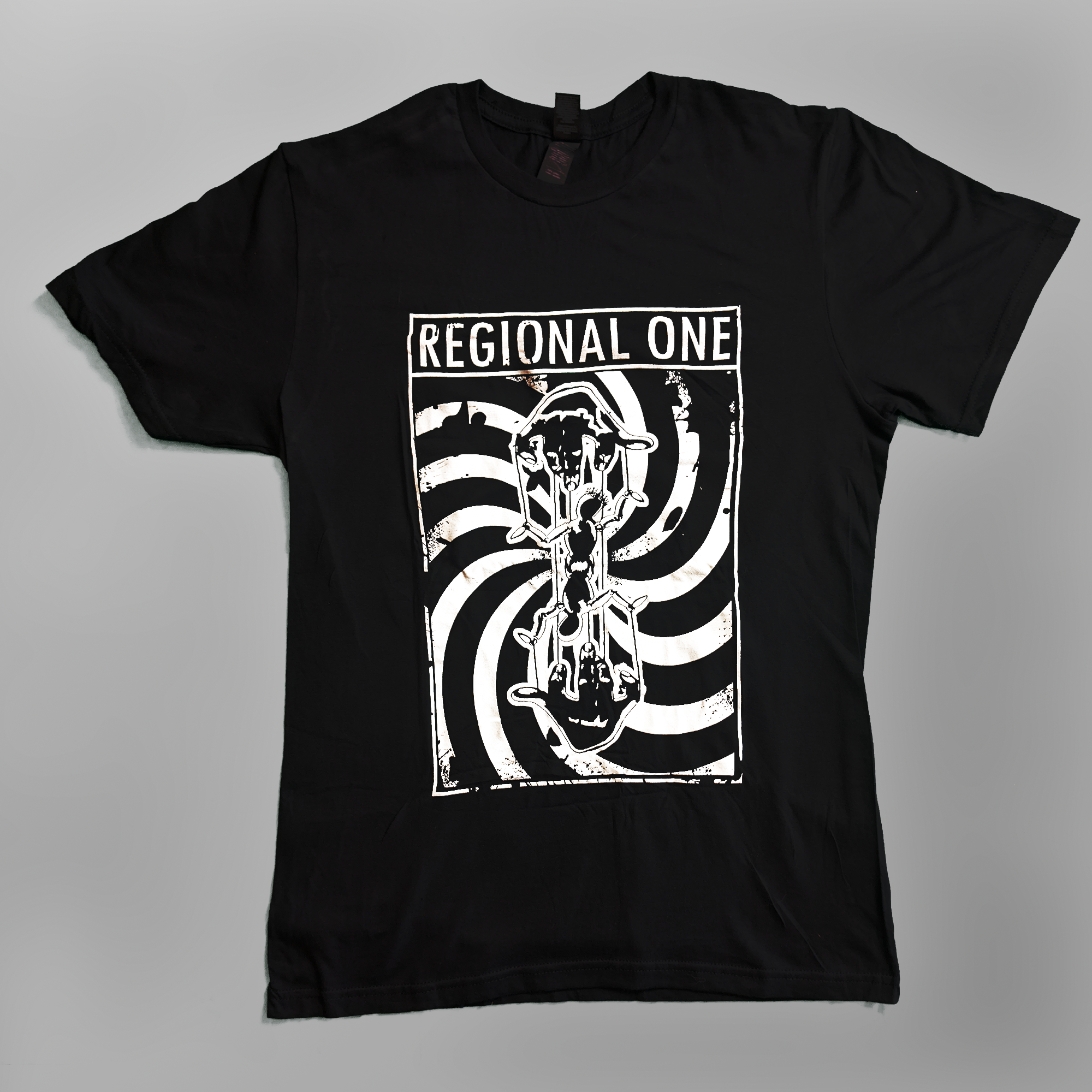 Regional One Puppet T-shirt featuring the full puppet design, modelled by Simon.