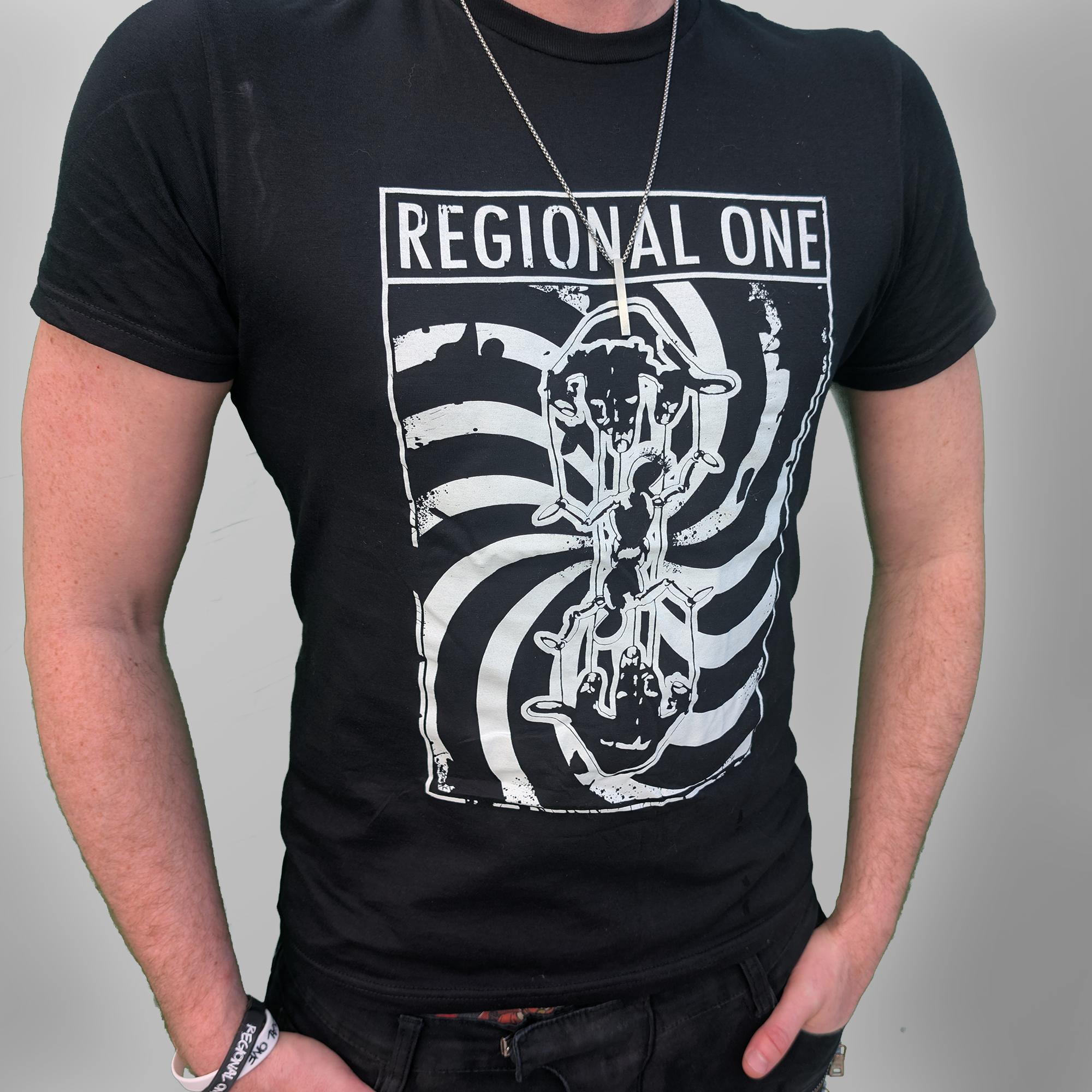 Regional One Puppet T-shirt featuring the full puppet design, modelled by Simon.