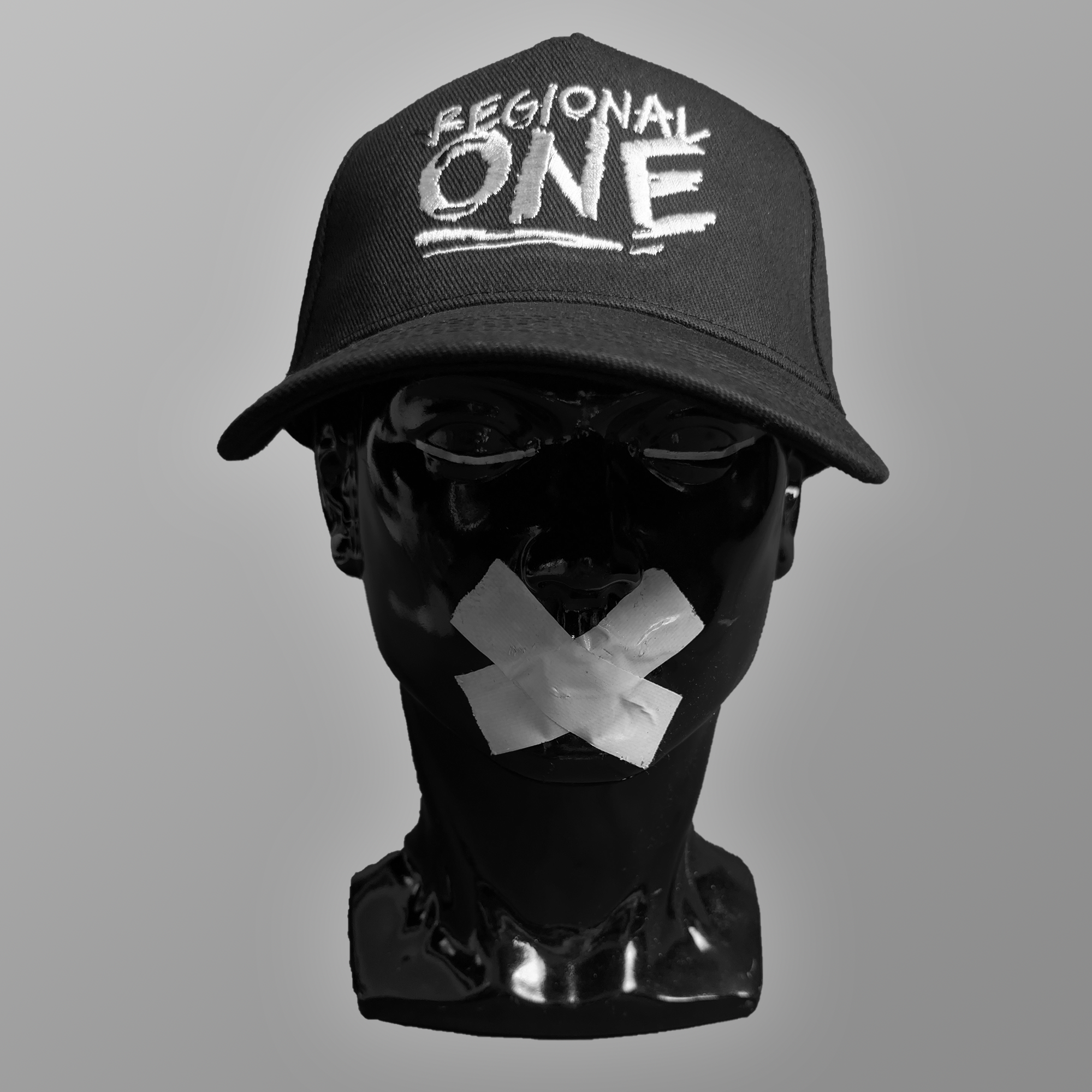 Regional One baseball cap featuring the band’s signature scribble logo on the front.